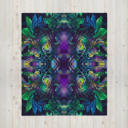 "Awakened" throw blanket shown flat, full floral mandala print visible.