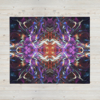 Another front view of the folded Dragon Heart mandala throw blanket showing the print in full.