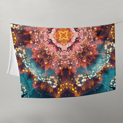 Straight-on front view of the folded Reaching for Light floral mandala throw blanket.