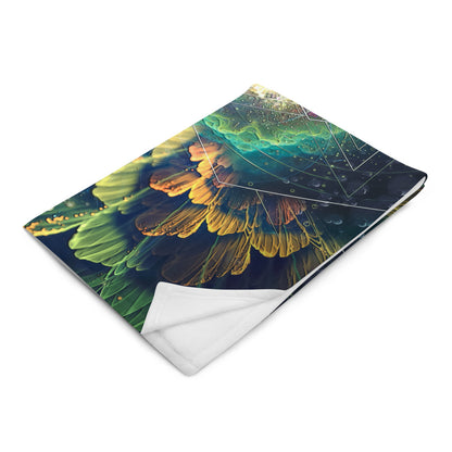 "Blossom" throw blanket photographed at an angle, showing print and fabric drape.