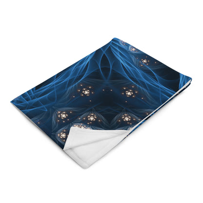 "Inner Sanctum" throw blanket photographed at an angle, showing print and fabric drape.