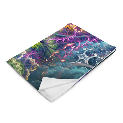 The "Emergence" throw blanket folded at an angle, showing the print and white backing