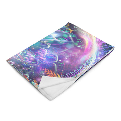 Angled front view of the folded Medicina ayahuasca throw blanket.