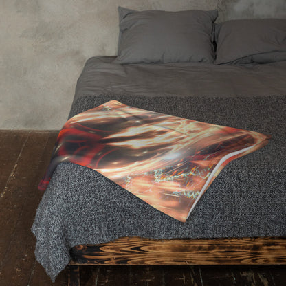 Muladhara root chakra mandala throw blanket wrapped around someone's shoulders in a cozy lifestyle scene.