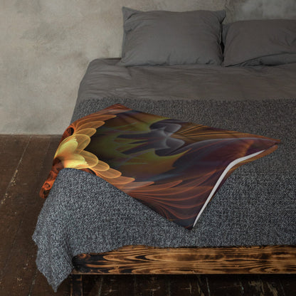 Totem Sun fractal mandala throw blanket draped over the arm of a couch in a home interior.