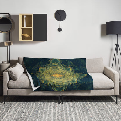 "Happy Thoughts" fractal mandala throw blanket draped over a couch in a living room.