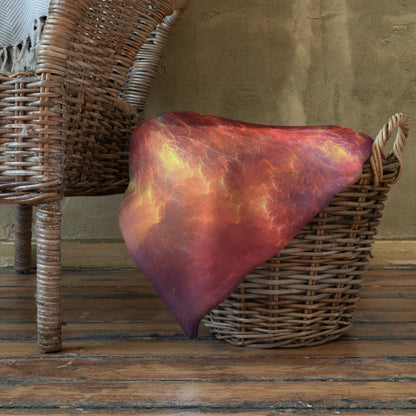 "Genesis" throw blanket styled across a bed, showing size and drape.