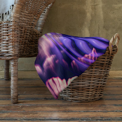"Flow State" throw blanket styled across a bed, showing size and drape.
