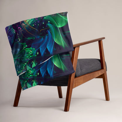 "Awakened" floral mandala throw blanket draped over a couch in a living room.