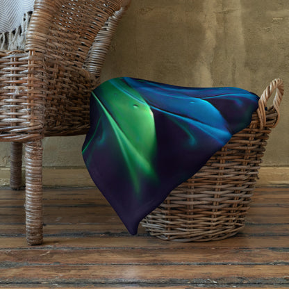 "Awakened" throw blanket styled across a bed, showing size and drape.