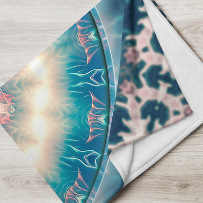 The "Triple Goddess" throw blanket styled on a couch in a living room