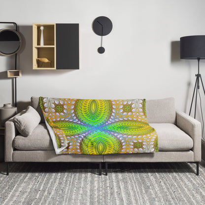 The "Activation Initiated" throw blanket draped over a couch, corner folded to show the white reverse side
