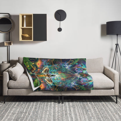 The To Bee or Not to Bee throw blanket draped over a couch in a cozy living room setting.