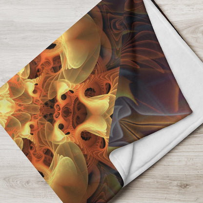 Totem Sun fractal mandala throw blanket draped over an armchair beside a window.