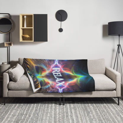 The Relax fractal typography throw blanket draped in a home lifestyle setting.