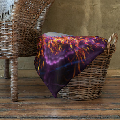 The Flower of Life fractal mandala throw blanket shown draped over furniture at home.