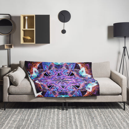 The Flower of Life fractal mandala throw blanket draped in a home lifestyle setting.