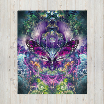 Front view of the "Emergence" throw blanket print laid flat on the floor