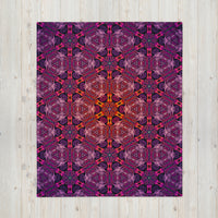 Close flat shot of the Forged In Neon throw blanket highlighting its swirling neon color gradients across the fabric.