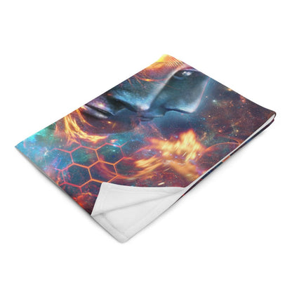 "The Wanderers" throw blanket folded at an angle, showing the print and white backing