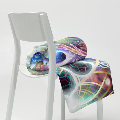 The "Divine Protection" throw blanket styled on a couch in a living room