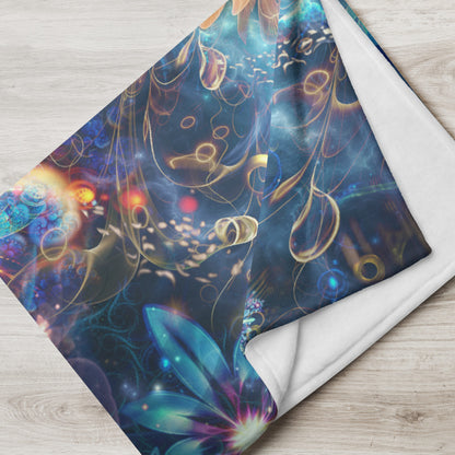 The "Polaris" throw blanket draped over a couch, corner folded to show the white reverse side