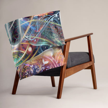 The "Divine Protection" throw blanket styled on a couch in a living room